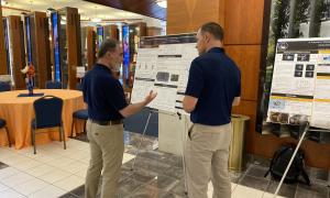 Poster Session:  Group shots of JANUS members viewing posters