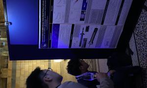 JANUS members at poster session.  Presenting and discussing posters. 