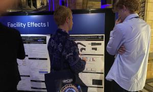 JANUS members at poster session.  Presenting and discussing posters. 